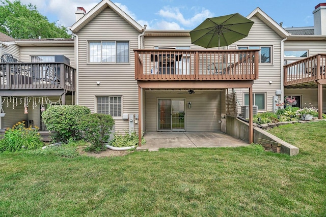 16636 Winding Creek Rd, Plainfield, IL 60586 - back of house featuring a patio, a deck, a yard, and a chimney