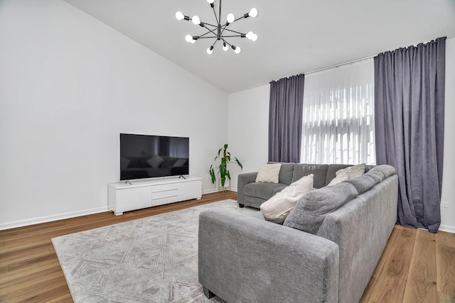 16636 Winding Creek Rd, Plainfield, IL 60586 - living area featuring a chandelier, lofted ceiling, and wood finished floors