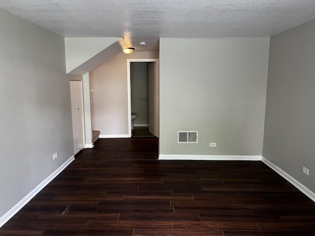 42 Pheasant Rd, Matteson, IL 60443 - empty room featuring wood finished floors and a textured ceiling