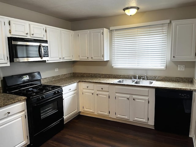 42 Pheasant Rd, Matteson, IL 60443 - kitchen with black appliances, white cabinets, and dark wood finished floors