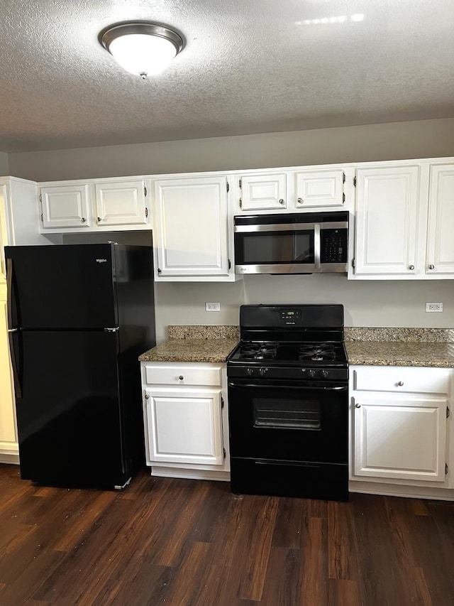 42 Pheasant Rd, Matteson, IL 60443 - kitchen with black appliances, dark wood-style flooring, white cabinets, stone counters, and a textured ceiling
