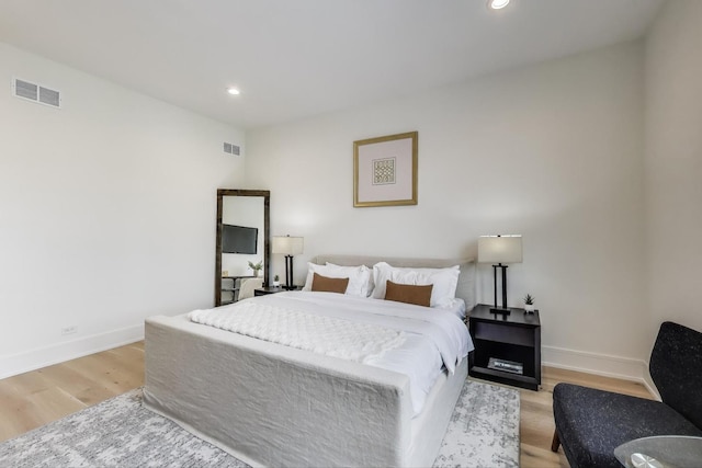 2611 W Carmen Ave, Chicago, IL 60625 - bedroom with light wood finished floors and recessed lighting