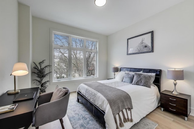 2611 W Carmen Ave, Chicago, IL 60625 - bedroom featuring light wood-style floors and a desk
