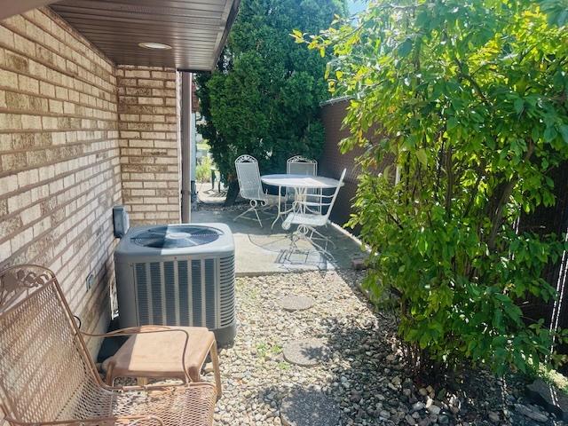 15800 S Laramie Ave Unit Q, Oak Forest, IL 60452 - view of patio / terrace featuring outdoor dining area