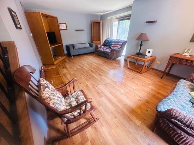 15800 S Laramie Ave Unit Q, Oak Forest, IL 60452 - living area with light wood-style flooring