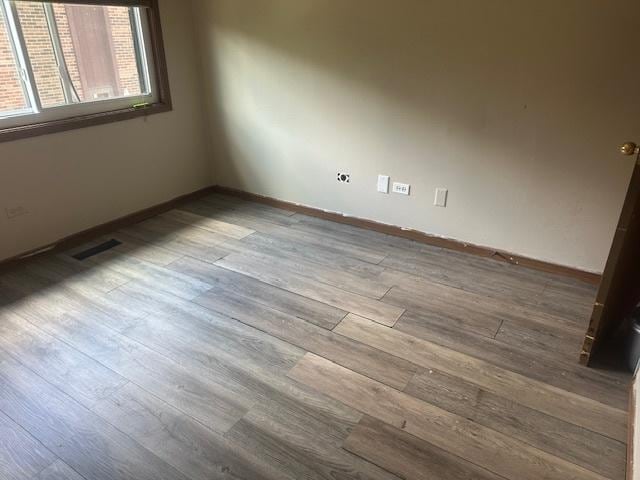15800 S Laramie Ave Unit Q, Oak Forest, IL 60452 - unfurnished room with wood finished floors