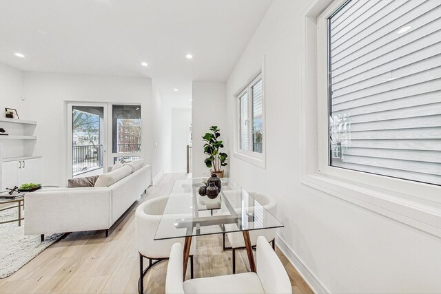 2607 W Carmen Ave, Chicago, IL 60625 - dining area featuring light wood finished floors and recessed lighting