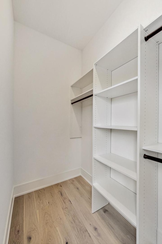 2607 W Carmen Ave, Chicago, IL 60625 - walk in closet with light wood-style flooring