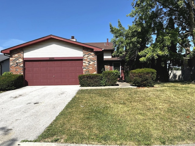 22526 Clarendon Ave, Richton Park, IL 60471 - ranch-style house featuring brick siding, a front lawn, a garage, and driveway