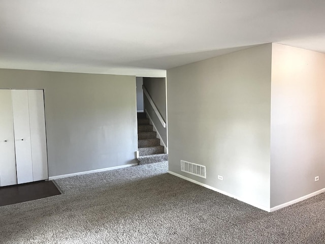 22526 Clarendon Ave, Richton Park, IL 60471 - carpeted empty room featuring stairway and baseboards