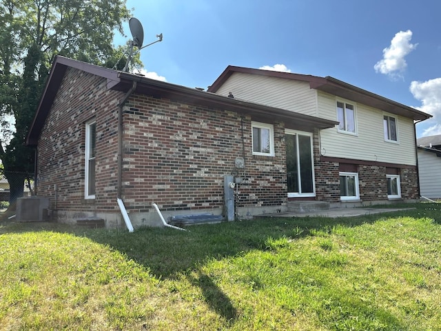 22526 Clarendon Ave, Richton Park, IL 60471 - back of house with a lawn and brick siding
