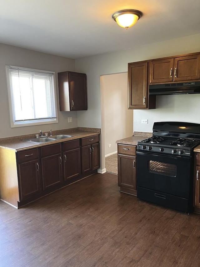 22526 Clarendon Ave, Richton Park, IL 60471 - kitchen featuring black range with gas stovetop, under cabinet range hood, dark wood-style floors, and dark brown cabinetry