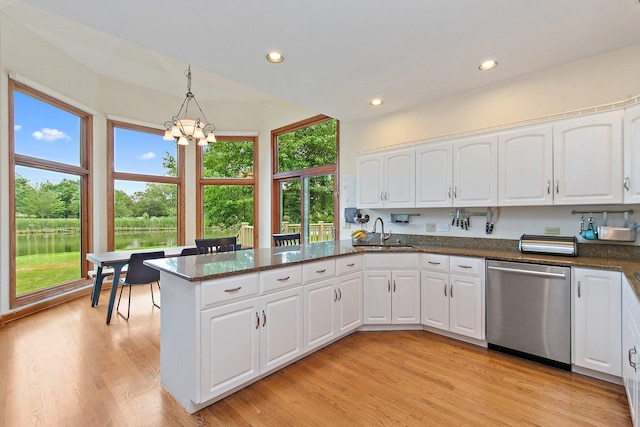1521 Pendelton Ct, Palatine, IL 60067 - kitchen with stainless steel dishwasher, a chandelier, white cabinetry, healthy amount of natural light, and recessed lighting