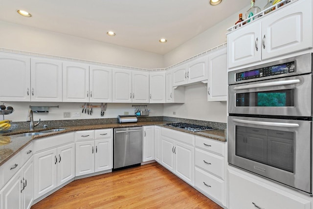 1521 Pendelton Ct, Palatine, IL 60067 - kitchen with stainless steel appliances, white cabinetry, dark stone counters, recessed lighting, and light wood-type flooring