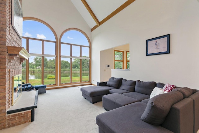 1521 Pendelton Ct, Palatine, IL 60067 - living area featuring high vaulted ceiling, carpet, beamed ceiling, a brick fireplace, and a water view