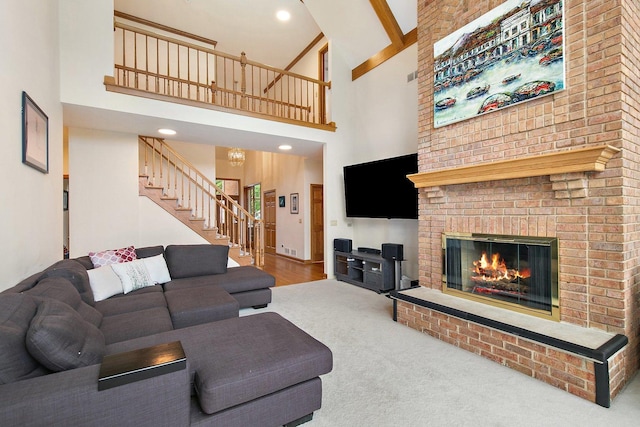 1521 Pendelton Ct, Palatine, IL 60067 - carpeted living room featuring stairs, a high ceiling, and a brick fireplace