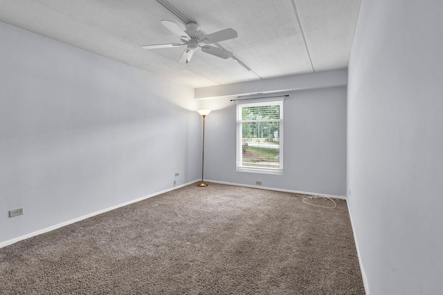 814 N River Rd Unit 1D, Mount Prospect, IL 60056 - empty room with carpet floors, a textured ceiling, and ceiling fan