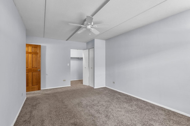 814 N River Rd Unit 1D, Mount Prospect, IL 60056 - unfurnished bedroom featuring carpet, ceiling fan, and a closet