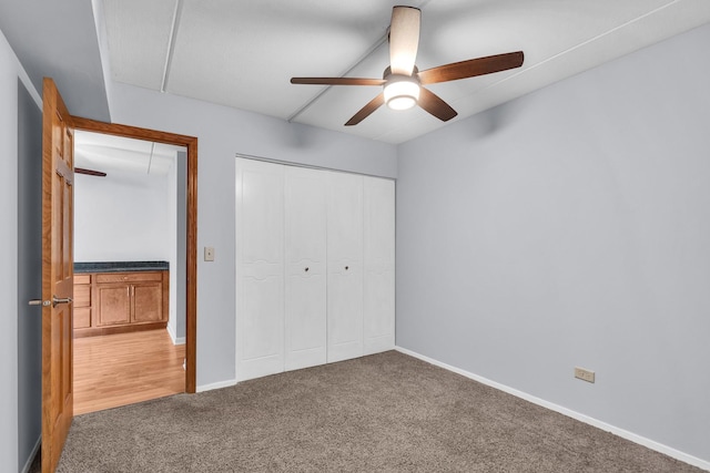 814 N River Rd Unit 1D, Mount Prospect, IL 60056 - unfurnished bedroom featuring attic access, carpet floors, a closet, and a ceiling fan
