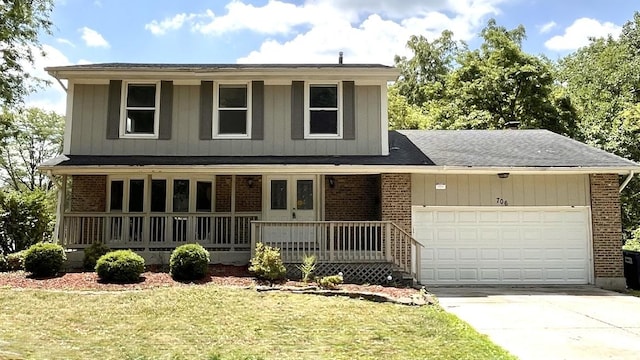 706 Carnation Ln, Matteson, IL 60443 - traditional-style home featuring covered porch, brick siding, a garage, and driveway