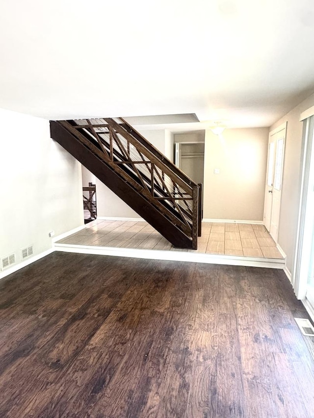 706 Carnation Ln, Matteson, IL 60443 - staircase with wood finished floors and baseboards