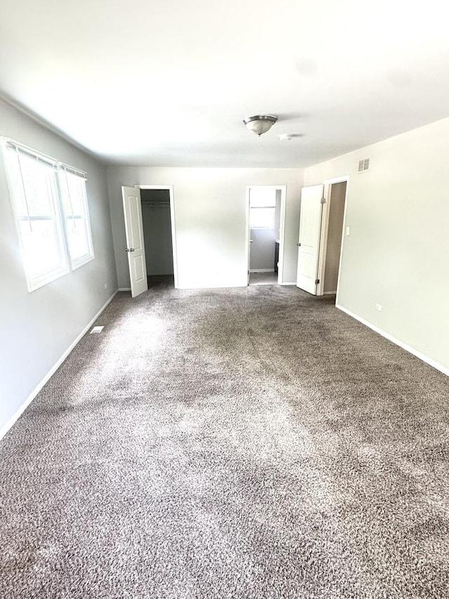 706 Carnation Ln, Matteson, IL 60443 - spare room with baseboards and carpet floors