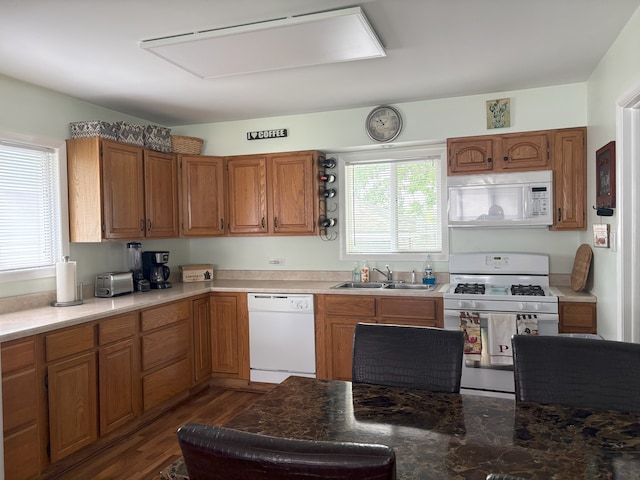 417 Major Dr, Northlake, IL 60164 - kitchen featuring white appliances, brown cabinetry, and dark wood-style flooring