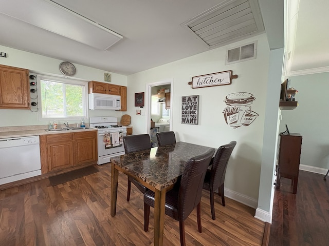 417 Major Dr, Northlake, IL 60164 - dining area featuring dark wood-type flooring and attic access