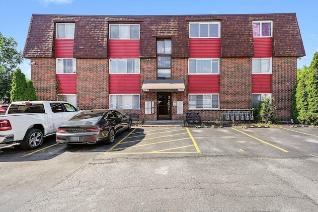 3848 25th Ave Unit 5, Schiller Park, IL 60176 - view of property featuring uncovered parking
