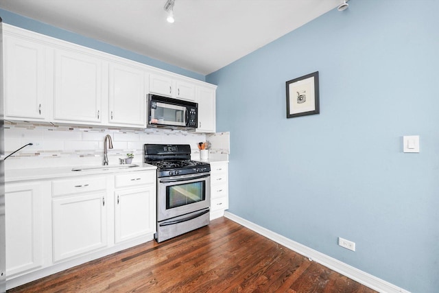 3848 25th Ave Unit 5, Schiller Park, IL 60176 - kitchen with appliances with stainless steel finishes, decorative backsplash, dark wood-style flooring, white cabinets, and light countertops
