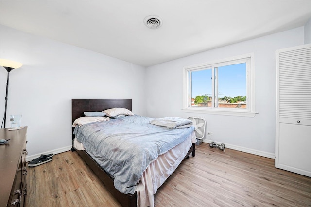 3848 25th Ave Unit 5, Schiller Park, IL 60176 - bedroom featuring light wood-type flooring and baseboards