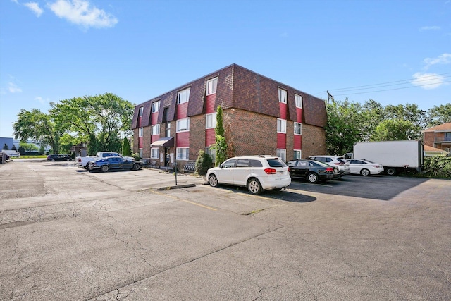 3848 25th Ave Unit 5, Schiller Park, IL 60176 - view of building exterior featuring uncovered parking