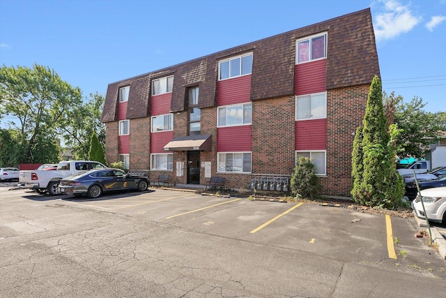 3848 25th Ave Unit 5, Schiller Park, IL 60176 - view of property featuring uncovered parking