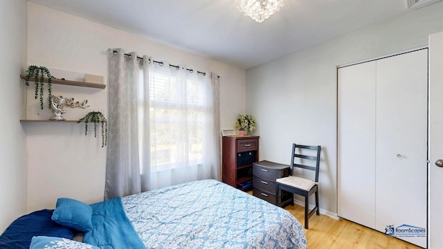 554 Foxford Rd, Bartlett, IL 60103 - bedroom featuring light wood-style flooring and a closet