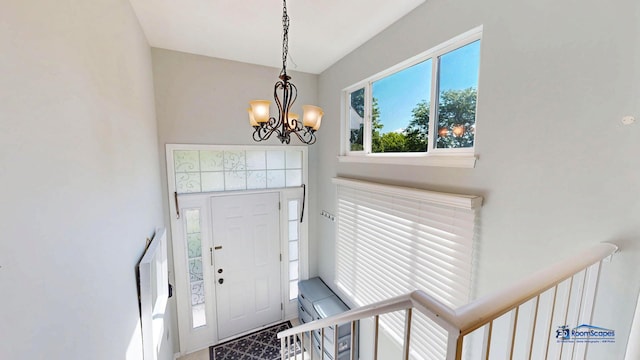 554 Foxford Rd, Bartlett, IL 60103 - foyer entrance with a chandelier