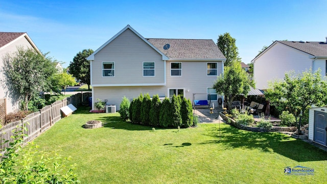 554 Foxford Rd, Bartlett, IL 60103 - back of house featuring a patio, an outdoor fire pit, and a fenced backyard