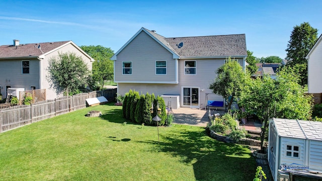 554 Foxford Rd, Bartlett, IL 60103 - rear view of house featuring a patio area and a shed