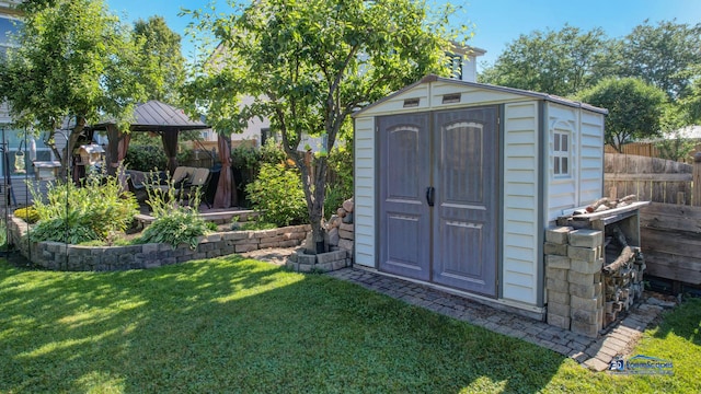 554 Foxford Rd, Bartlett, IL 60103 - view of shed featuring a gazebo and a fenced backyard