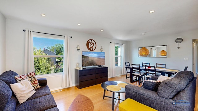 554 Foxford Rd, Bartlett, IL 60103 - living room with light wood-style flooring and recessed lighting