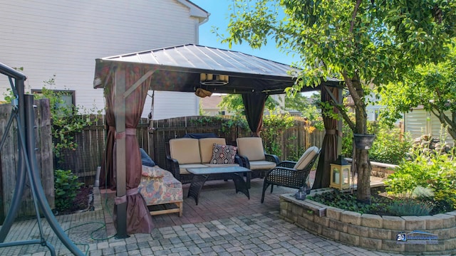 554 Foxford Rd, Bartlett, IL 60103 - fenced backyard featuring a gazebo, an outdoor living space, and a patio area