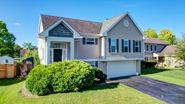 554 Foxford Rd, Bartlett, IL 60103 - view of front of home featuring a garage and driveway
