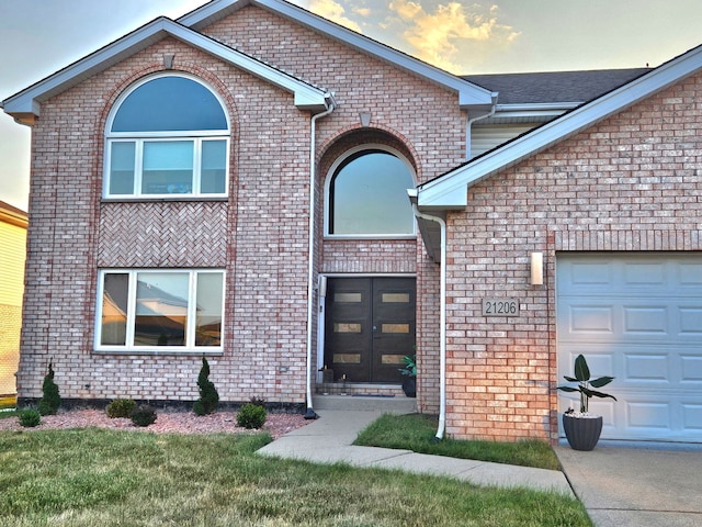 21206 Sophia Dr, Matteson, IL 60443 - entrance to property featuring french doors, a garage, and brick siding
