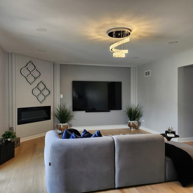 21206 Sophia Dr, Matteson, IL 60443 - living room with light wood-style flooring and baseboards