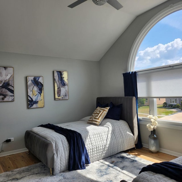 21206 Sophia Dr, Matteson, IL 60443 - bedroom with wood finished floors and vaulted ceiling