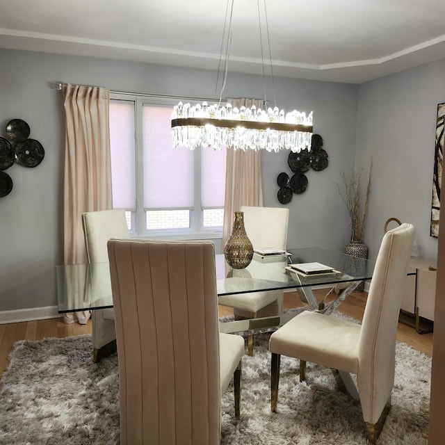 21206 Sophia Dr, Matteson, IL 60443 - dining space with wood finished floors and a chandelier