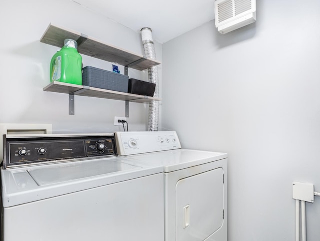 8429 162nd Pl Unit 3, Tinley Park, IL 60487 - laundry area with washer and dryer and a wall unit AC