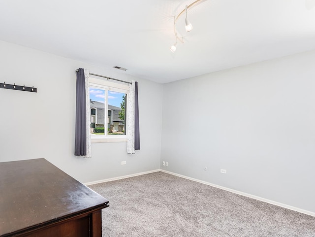 8429 162nd Pl Unit 3, Tinley Park, IL 60487 - spare room featuring carpet floors and track lighting