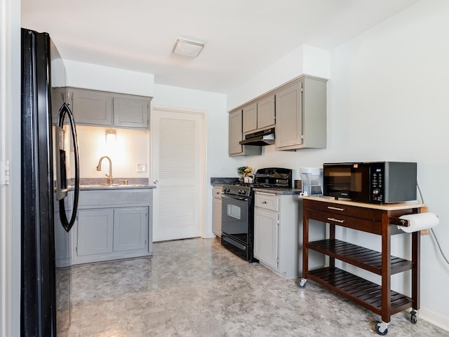 8429 162nd Pl Unit 3, Tinley Park, IL 60487 - kitchen featuring black appliances, under cabinet range hood, and gray cabinetry