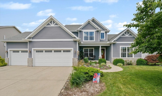 204 Campbell St, Tolono, IL 61880 - view of front of property with a garage, driveway, a front yard, a porch, and a shingled roof