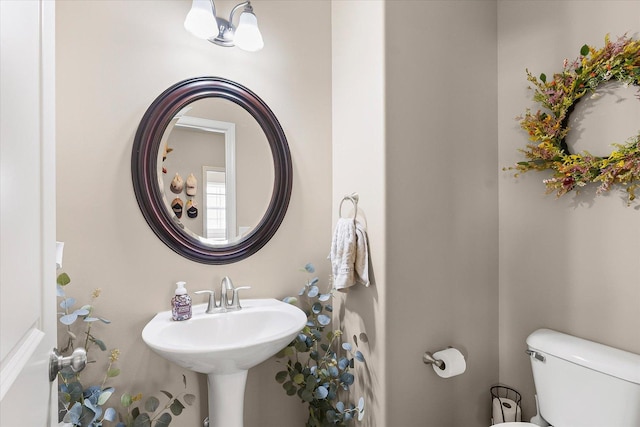 204 Campbell St, Tolono, IL 61880 - half bathroom with toilet and a sink